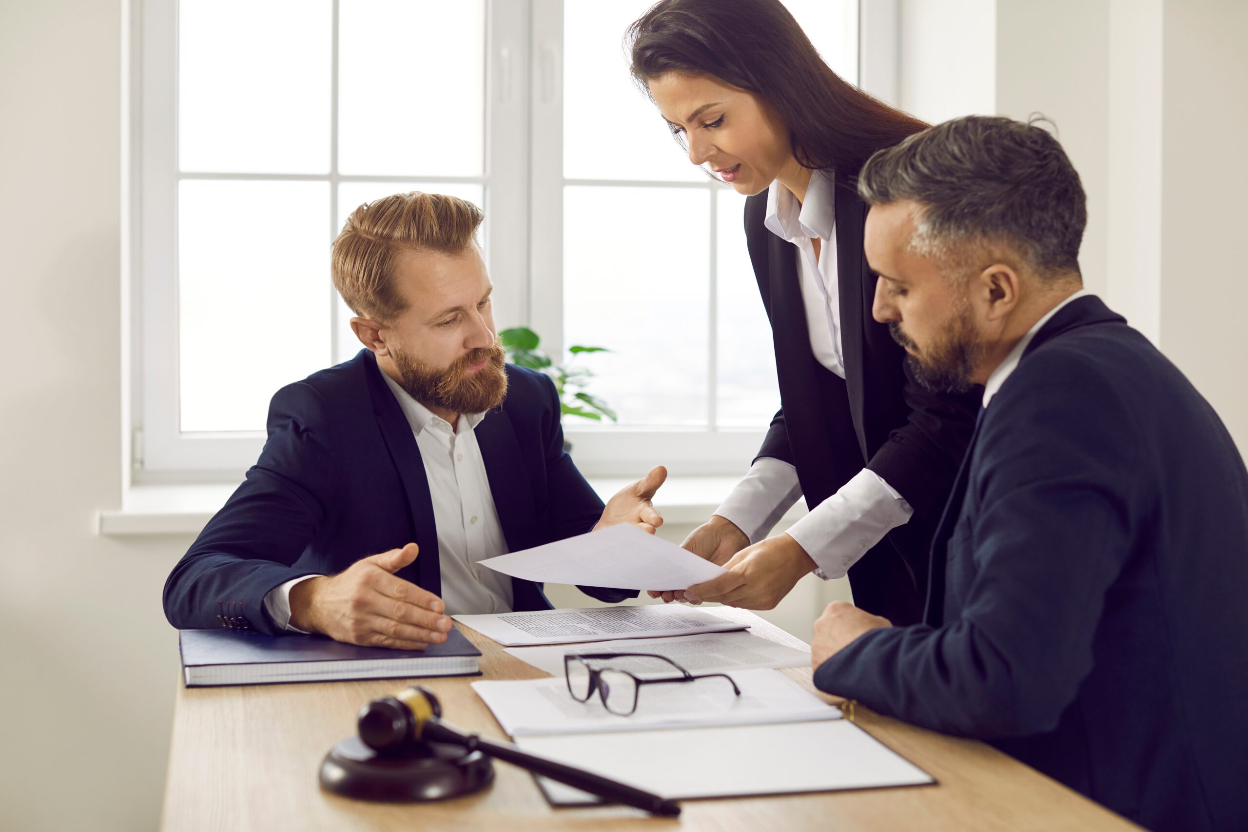 Group of Experienced Attorneys and Lawyers Giving Consultation to Client