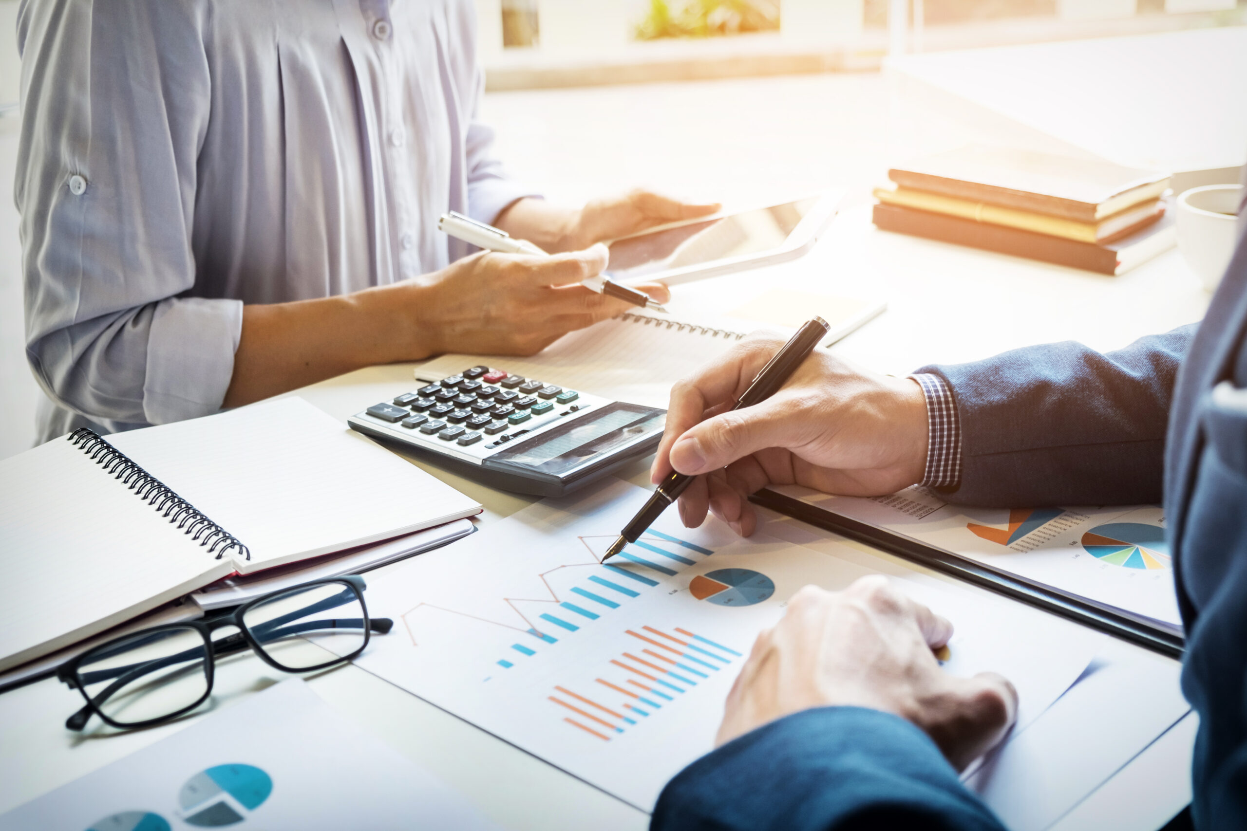 Businessman Financial Inspector and Secretary Making Report